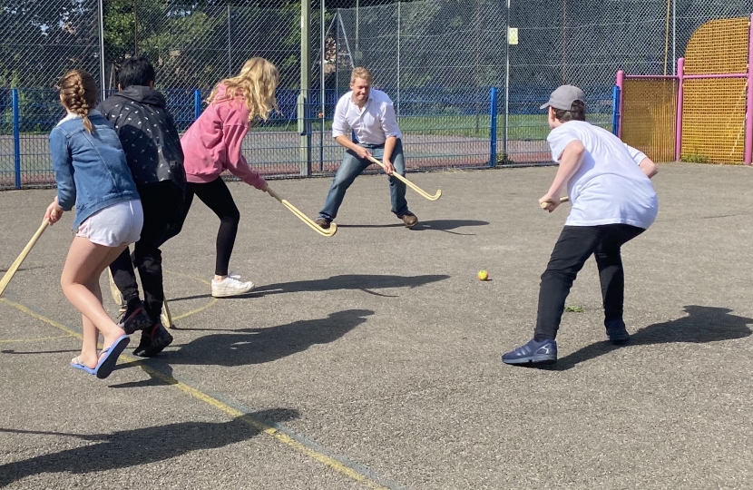 A quick game of hockey at Gogmore Park Youth Club
