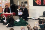 Presenting the winning certificate at the Grange Infant School