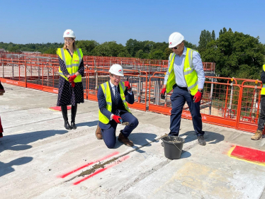 Dr Ben Spencer MP 'topping out' the new mental health hospital in Chertsey